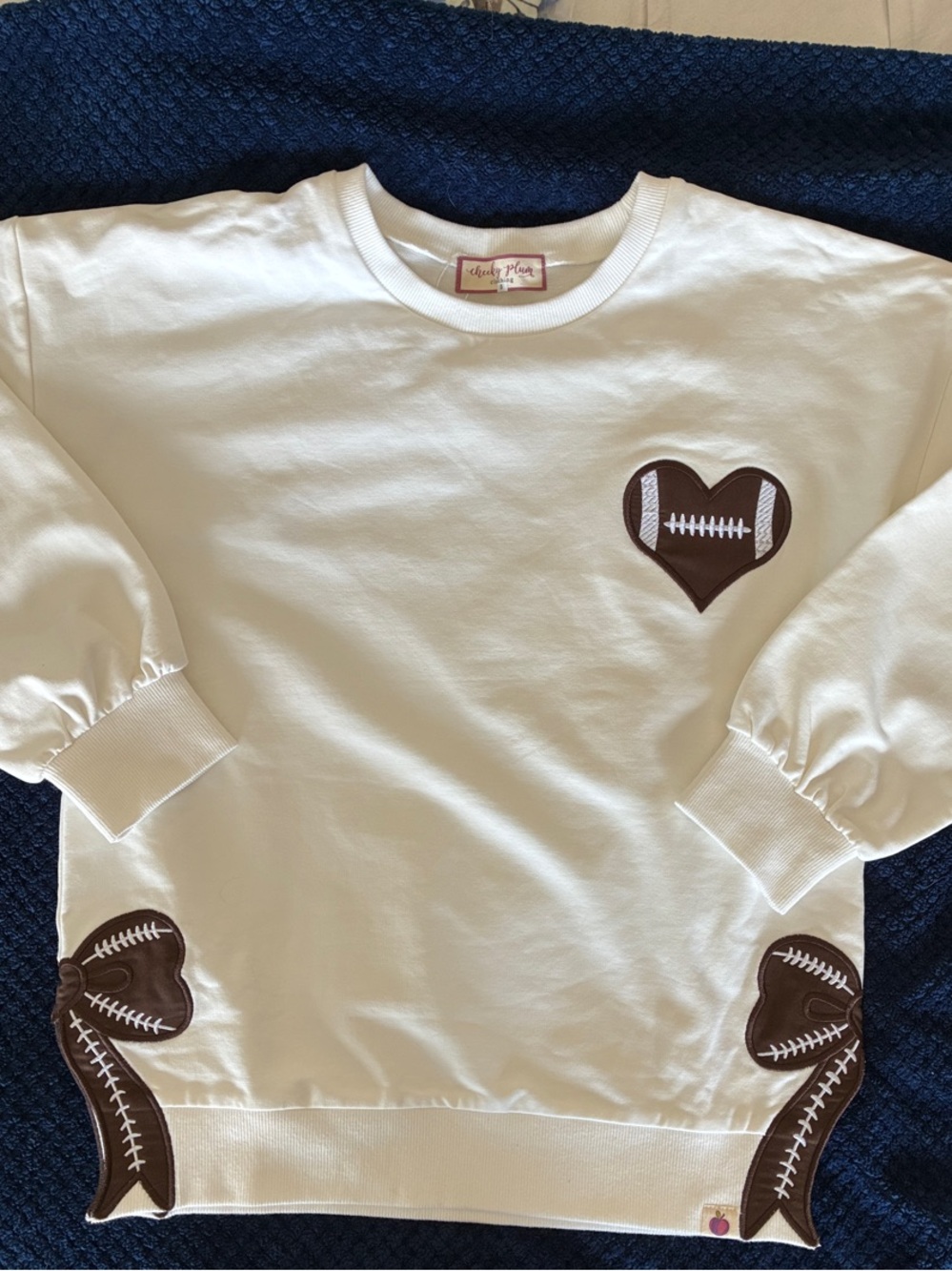 cheeky plum Cream Sweatshirt with Brown Football Heart Patches